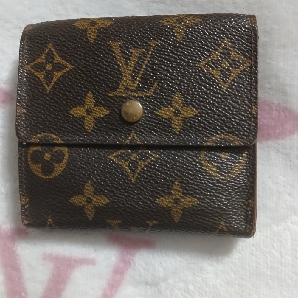 Authentic Louis Vuitton Brown Monogram Wallet.